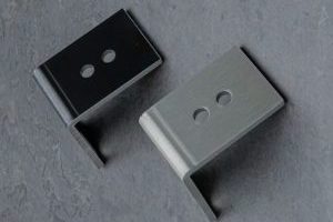 L-shape brackets with clear and black anodizing